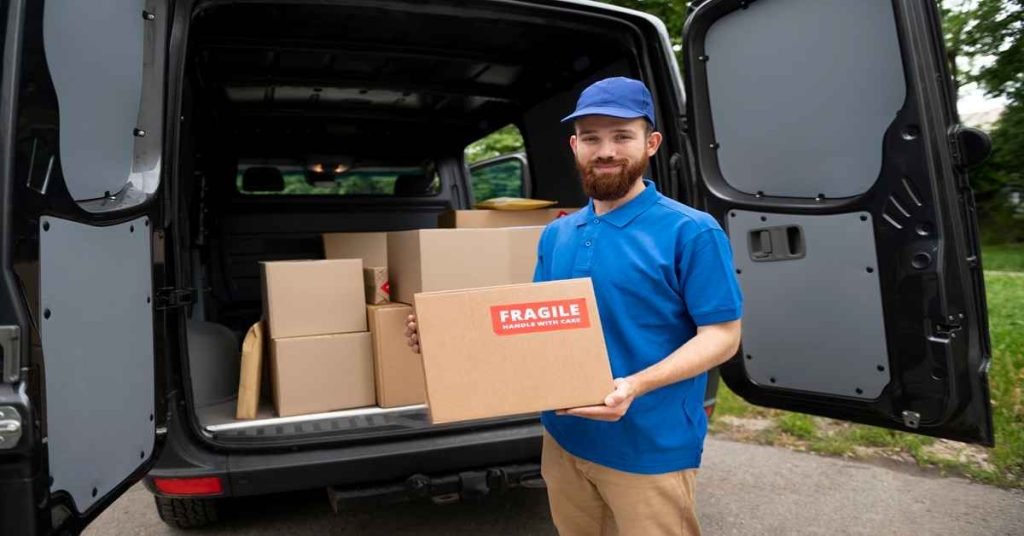 delivery man handling a box